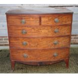 A 19th Century mahogany bowfront chest of two short and three long drawers with circular brass