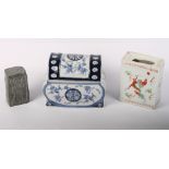 A Chinese soapstone carving, a Chinese porcelain pillow and a Chinese blue and white crackle ware