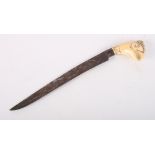 An Indonesian carved ivory Garuda head knife, blade 6 1/4" long