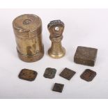 A Byzantine bronze weight, a 19th Century brass measure and drum weights