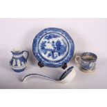 A 19th Century Willow pattern soup bowl, a blue and white mug with transfer decoration of a milk