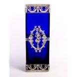 A 19th Century French Empire cobalt blue glass vase with white metal mounts decorated maidens in