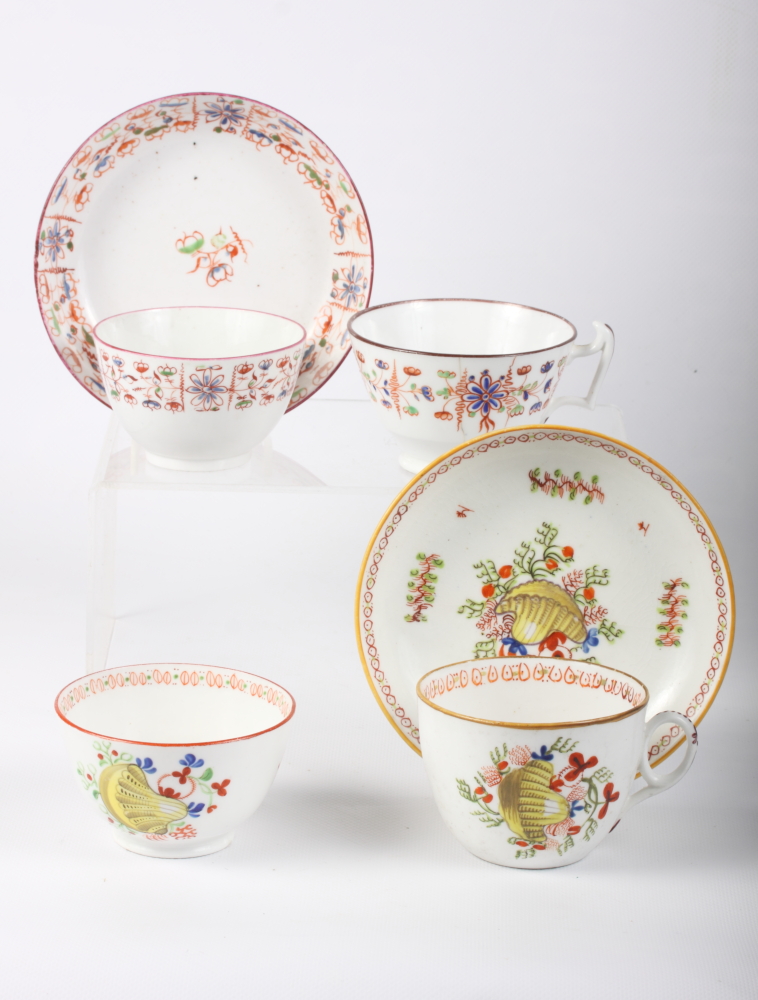 A New Hall bone china pattern 1045 tea cup saucer and a tea bowl, one other New Hall tea cup and