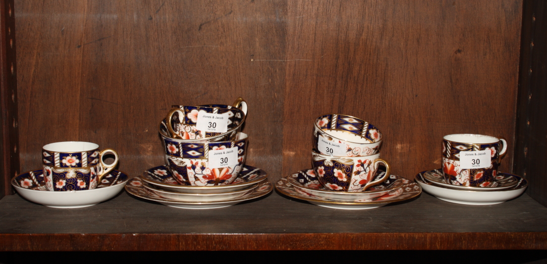 Seven Royal Crown Derby pattern 2451 tea and coffee cups, six saucers and three side plates (two - Image 2 of 2