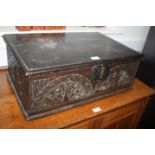 An early 18th Century chip carved oak Bible box with planked top, 24" wide