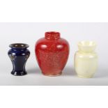 A Doulton flambe oviform vase, 4" high, a bone china lustre decorated vase, 3 1/4" high, and one