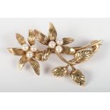 A 9ct gold floral spray brooch set pearls, 6.7g gross