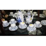 A Royal Copenhagen porcelain part coffee set to include six coffee cups and saucers, coffee pot 7