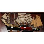 A wooden model of "Cutty Sark", 18" high, and two other models of "HMS Victory" and "America"