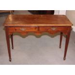 A Victorian mahogany side table, fitted two drawers, on square taper supports, 42" wide (top