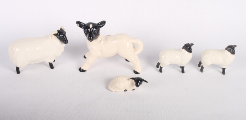 A Beswick black faced sheep, 3" high, two smaller Beswick sheep and two others