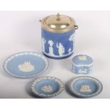 A Wedgwood blue jasperware biscuit barrel, a similar trinket box and three dishes