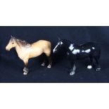 A Beswick Highland pony and a black pony