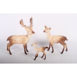 A Beswick model of a stag, a doe and a faun