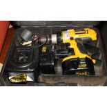 A DeWalt 14 volt cordless drill, in case, and a Metabo corded drill, in case
