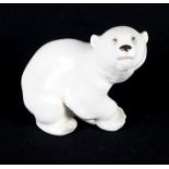 A Beswick Dalmatian, 3 1/2" high, three other models of Dalmatians, a pair of polar bears and a pair