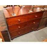 A 19th Century mahogany chest of three long drawers with turned wooden knobs, on ball supports,