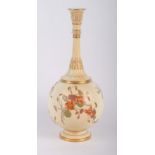 A Royal Worcester blush ivory bottle-shaped vase decorated in gilt and flowers, 12" high