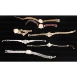 A lady's 9ct gold Rotary bracelet watch, two ladies gold cased wristwatches and four other ladies