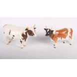 Two Beswick models of Ayrshire cattle, "Champion Whitehill Mandate" and "Champion Ickham Bessie" (