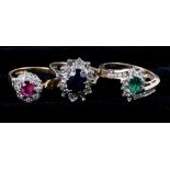 An 18ct gold cluster ring set emerald and diamonds, size N/O, an 18ct gold cluster ring set ruby and