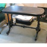 A 19th Century ebonised centre table with box line inlay and tilt brass mounts, on splay supports,