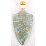 A Royal Worcester shield-shaped scent bottle decorated gilt "seaweed" pattern on a powdered