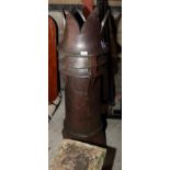 A brown glazed stoneware chimney pot, 44" high