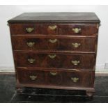 An early Georgian figured walnut and inlaid chest of four long graduated drawers with original brass