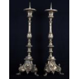 A pair of brass pricket altar candlesticks on triangular bases, 29" high