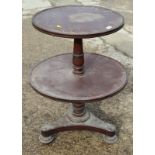 A 19th Century mahogany two-tier dumb waiter on triangular base, 25" dia