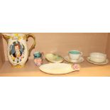 A Clarice Cliff floral decorated two-handled soup coupe and stand, a Beswick "Robert Burns" jug,