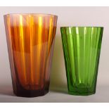 An octagonal heavy amber glass vase, 12" high, a similar smaller green glass vase (edge chips), a