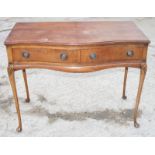 A Georgian design serpentine front serving table, fitted two frieze drawers, 39" wide