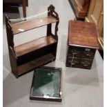 A three-tier wall shelf, a nest of four Victorian drawers and a rectangular wooden tray with Chinese