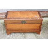 A camphor wood blanket box, on shaped bracket supports, 35" wide