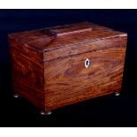 A Regency rosewood two-compartment sarcophagus tea caddy, 8 3/4" wide