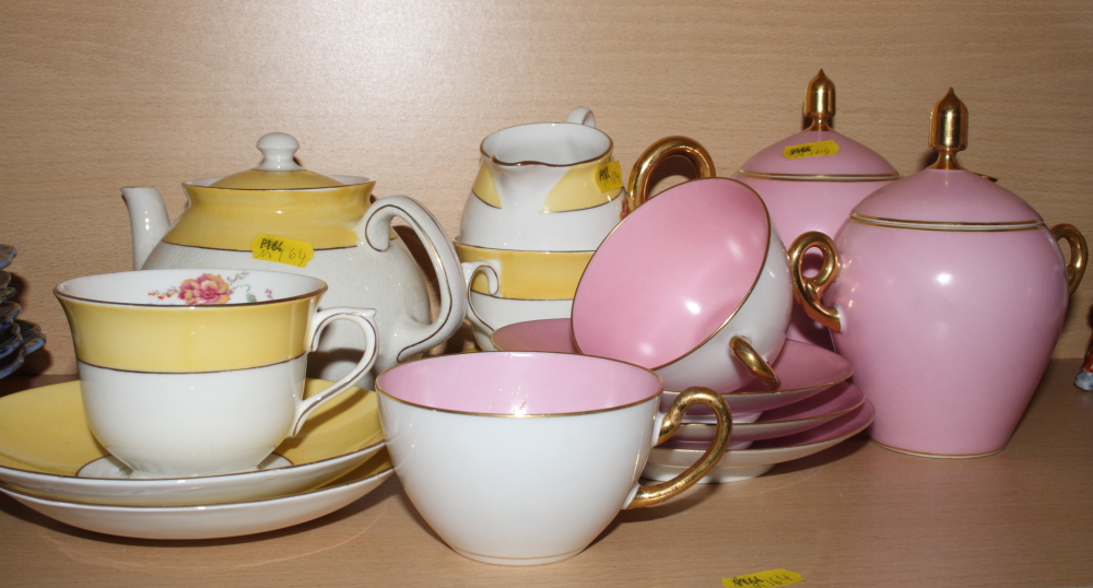 Two morning tea sets decorated pink, yellow and gilt