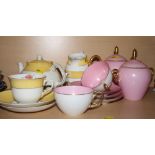 Two morning tea sets decorated pink, yellow and gilt