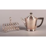 An Art Deco silver plated stylised teapot by Keith Murray for Mappin & Webb and a silver plated