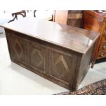 A 17th Century oak blanket box with original iron lock, three panel front carved lozenges, 46" long