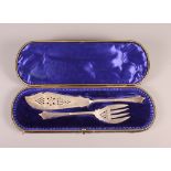 A pair of silver fish servers with pierced and engraved decoration, in fitted case, 5.4oz troy