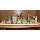 An oriental green porcelain coffee set, bases inset lithophanes, and other items of decorative