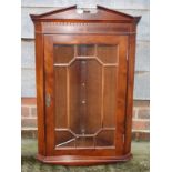 A Georgian design yew wall corner display cabinet enclosed beaded glazed door and glass shelves, 20"