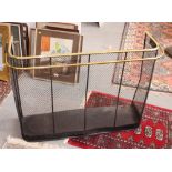 A 19th Century design wirework nursery fender with extending brass towel rail, 38" wide