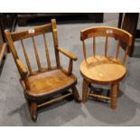 A child's elm panel seat rocking chair and a child's circular panel seat chair