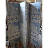 A four-fold draught screen covered blue patterned material, 71" high