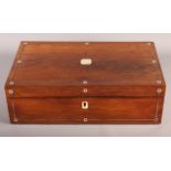 A 19th Century rosewood writing box inlaid pewter stringing and mother-of-pearl buttons and a