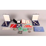 A number of British and World coins, coin sets, commemorative crowns, etc, to include a silver proof