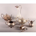 A glass and silver plated claret jug and a silver plated three-piece teaset, etc